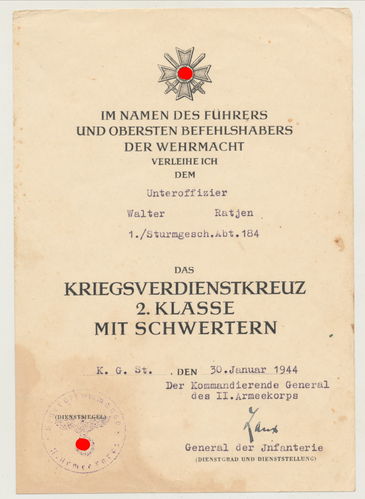 Urkunde KVK Kriegsverdienstkreuz 1./ Sturmgeschütz Abt. 184 mit Original Unterschrift General Laux