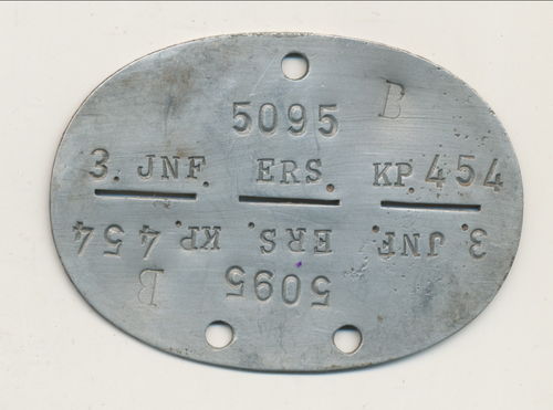Erkennungsmarke Wehrmacht 3./ Inf Ers. Btl. 454 Detmold Bastogne Kanalküste Frankreich