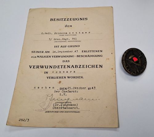 Urkunde Grenadier Rgt. 351 mit Verwundetenabzeichen Schwarz ausgestellt in Aachen 1943